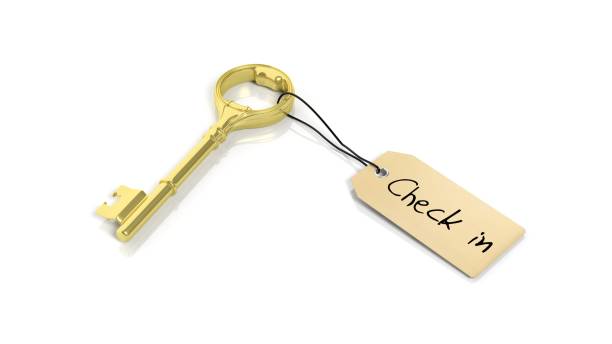 istock Tag with phrase Check in on golden retro key , isolated on white background. 1027594006