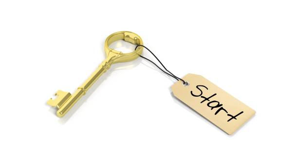 istock Tag with word Start on golden retro key , isolated on white background. 1027594152
