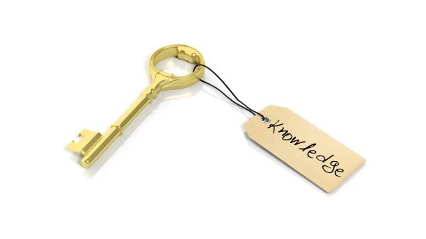 istock Tag with word Knowledge on golden retro key , isolated on white background. 1027594172