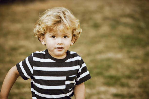 istock child 2 years old in public park 1027594556