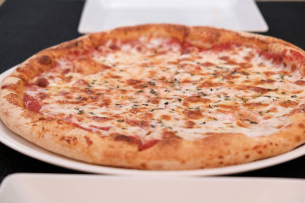 istock Close-up of four cheese pizza 1027599202