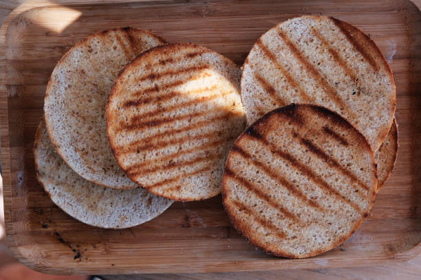 istock Close-up of burger buns cooked on grill 1027600140