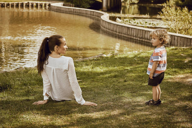 istock mother and child in park 1027603158
