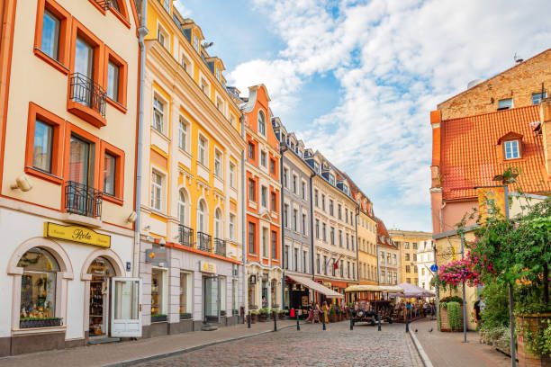 Riga, Latvia - July, 22, 2018: Street view from old town of Riga with cafe and restaurants. The famous historical centre of Riga located in old town, The historic centre of Riga was designated a UNESCO World Heritage site in 1997.