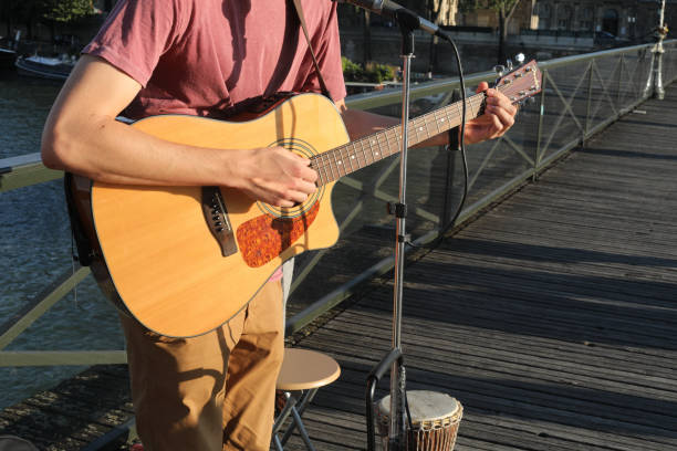 istock guitarist outdoor 1027613640