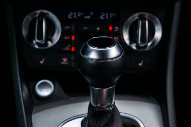 istock Car inside. Interior of a car. Comfortable leather Black seats. Black perforated leather. Car interior details. Car detailing 1027614542