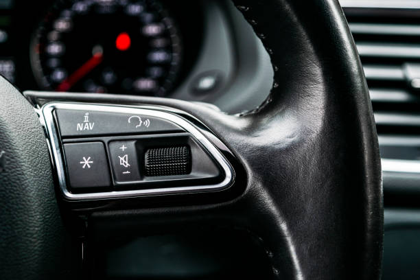 istock Car inside. Interior of a car. Comfortable leather Black seats. Black perforated leather. Car interior details. Car detailing 1027615020