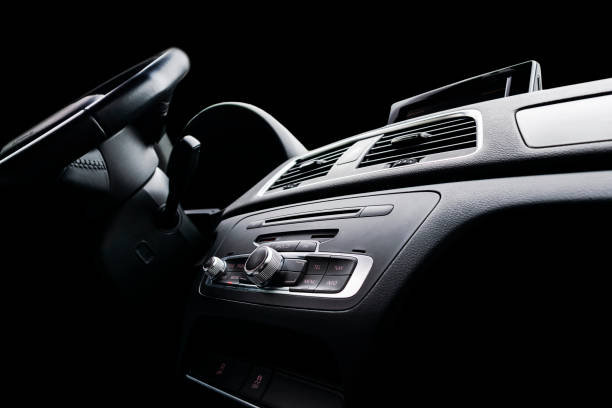 istock Car inside. Interior of a car. Comfortable leather Black seats. Black perforated leather. Car interior details. Car detailing 1027615236