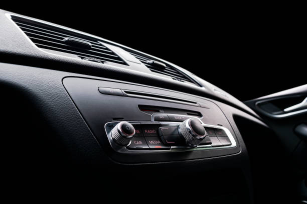 istock Car inside. Interior of a car. Comfortable leather Black seats. Black perforated leather. Car interior details. Car detailing 1027615562