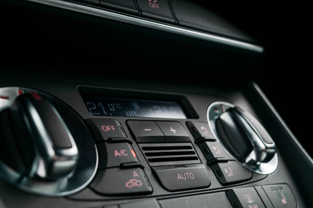 istock Car inside. Interior of a car. Comfortable leather Black seats. Black perforated leather. Car interior details. Car detailing 1027615764