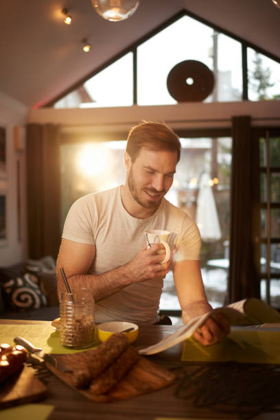 istock Man at home having coffee and breakfast 1027619680