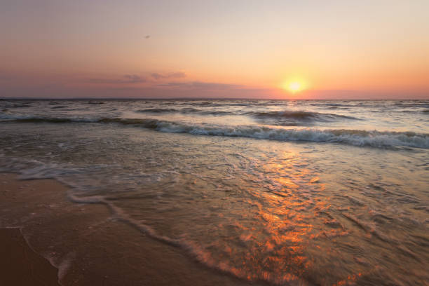 istock sunrise on the water 1027623588
