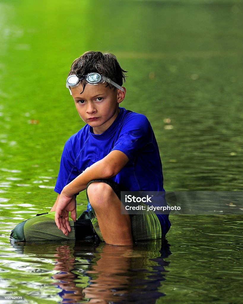 Boy in river  Boys Stock Photo