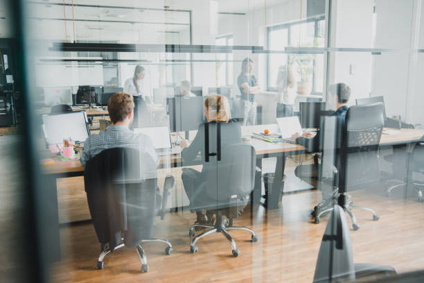 istock Group of people working in the office 1027634630