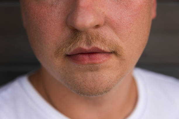 istock Man with mustache in natural light. November the month mustache 1027639364