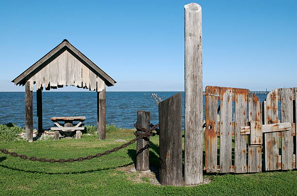 By the water picnic table stock photo