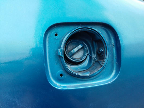 istock Old fuel tank cap on old blue car 1027658724