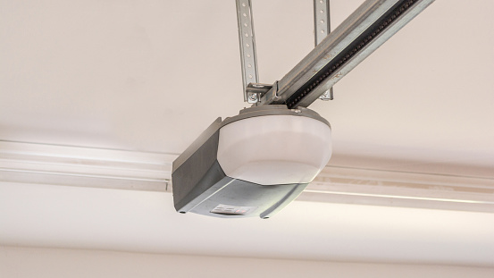 Automatic Garage Door Opener Motor on the Ceiling. Close Up
