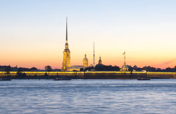 Peter and Paul Fortress at white night, Saint Petersburg, Russia Peter and Paul Fortress at white night, Saint Petersburg, Russia peter and paul cathedral st petersburg stock pictures, royalty-free photos & images