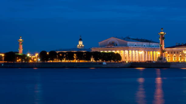 istock Old Stock Exchange building and Rostral columns on Vasilyevsky island at night, Saint Petersburg, Russia 1027673150