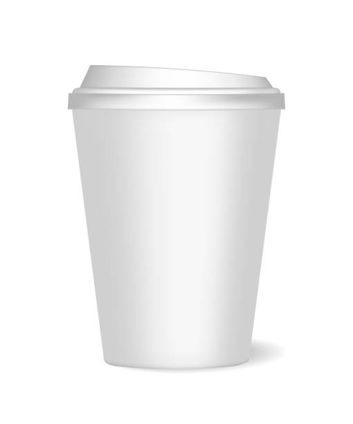 istock A mockup of a smoll paper cup with lid and realistic shadow for coffee, tea, drinks, water. Can be used as a template for design. 1027674930