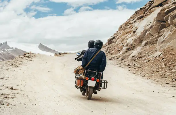 Motobike travelers ride in indian Himalaya roads