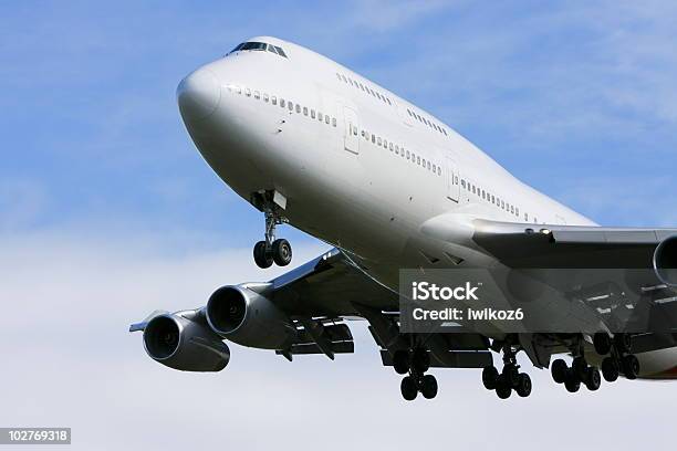 Boeing 747 Airliner Flying Low Overhead Stock Photo - Download Image Now - Airplane, Aerospace Industry, Air Vehicle