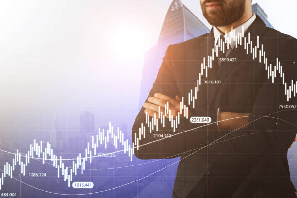 istock businessman and business stock chart 1027693848