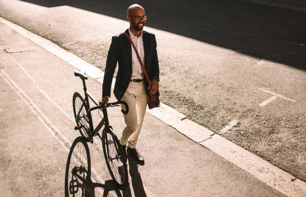 istock African businessman going office with his bike 1027697320