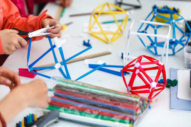 istock Colored boxes with paper strips, inventions and creativity for children. educational activities for schools and children 1027699046