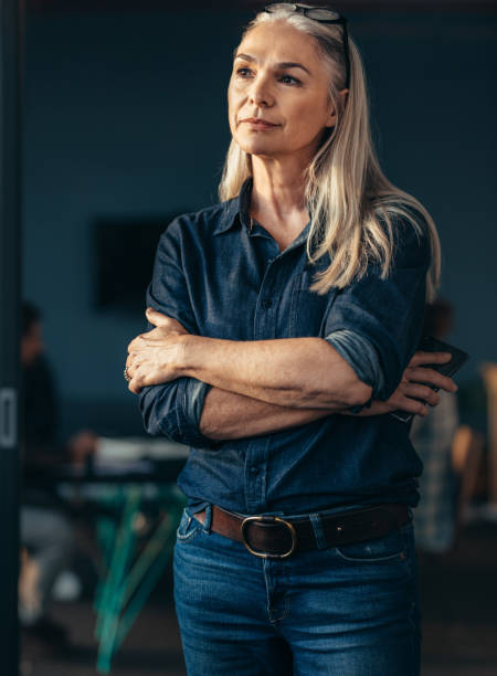 istock Thoughtful female business owner in office 1027701130