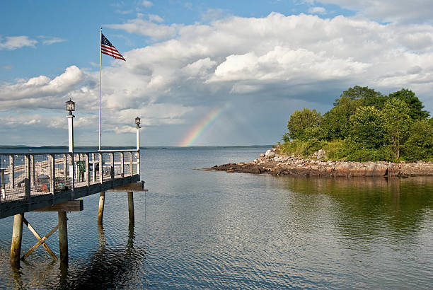 istock Frenchman Bay with Flag and Rainbow in Bar Harbor Maine 102770437
