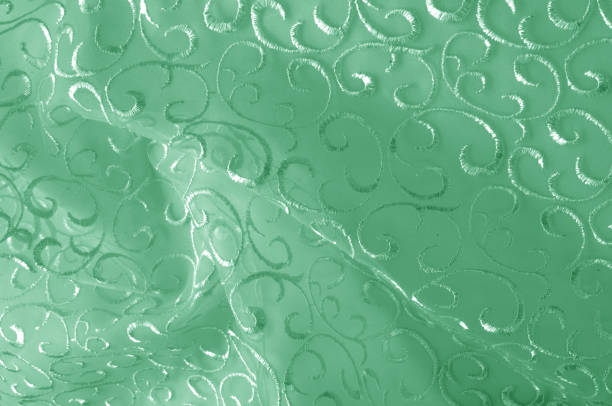istock Background texture, pattern. green tulle. Add an antique touch to your design projects, this tulle can be used to add more texture and volume to your design, pages and fashion accessories. 1027704596