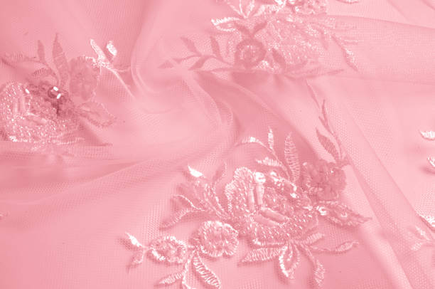 istock texture pink tulle. Metallic fuchsial flower embroidered tulle panel. Light, extremely thin, it is soft visually and suitable for designs, crafts, accessories, flower arrangements, gift baskets, 1027704696
