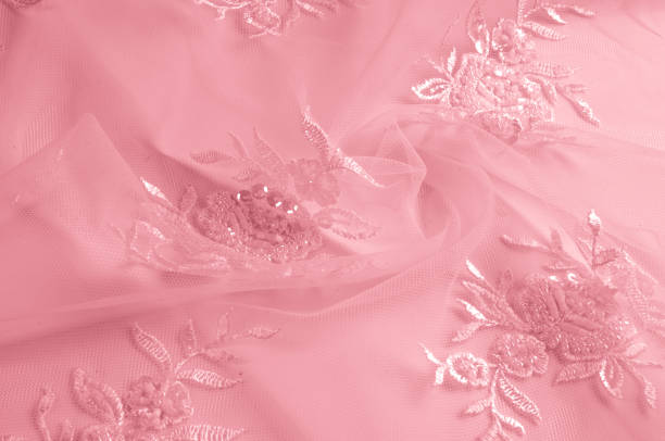 istock texture pink tulle. Metallic fuchsial flower embroidered tulle panel. Light, extremely thin, it is soft visually and suitable for designs, crafts, accessories, flower arrangements, gift baskets, 1027704804