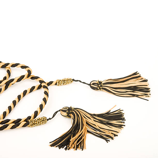 istock Gold and black rope with tassles. 102770585