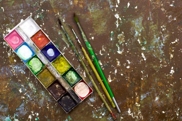 istock old used watercolor paint palette 1027714422