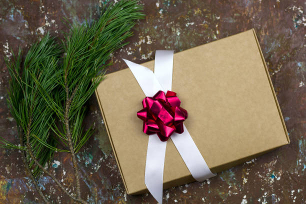 istock festive gift boxes brown shabby vintage background 1027714978