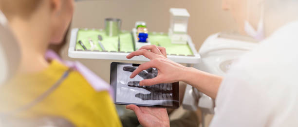 istock Woman in dentist's office 1027722368