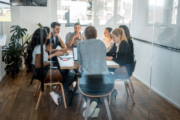 istock Group of businesspeople brainstorming new ideas 1027724088