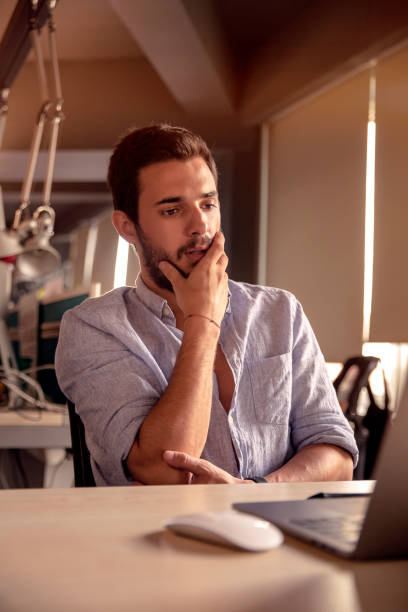 istock Pensive Businessman Working at Office 1027728164