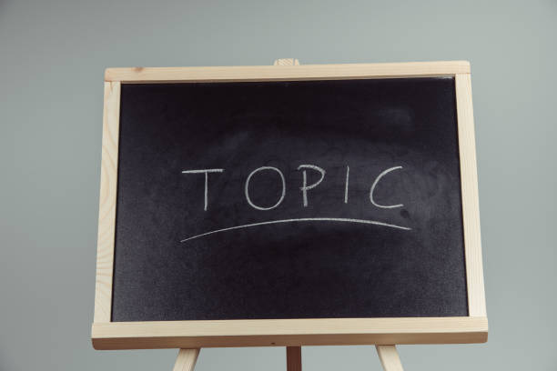 istock Topic written in white chalk on a black chalkboard 1027730996