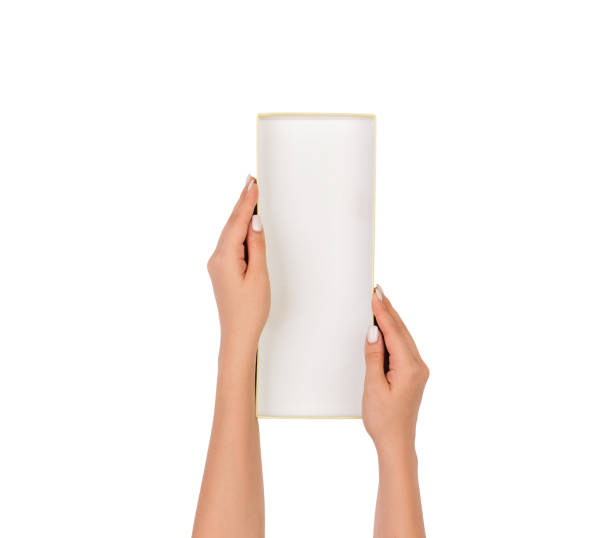 istock A woman hands hold a white empty paper box container, tidy and top view isolated white 1027734586