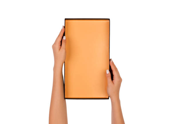 istock A woman hands hold a orange empty paper box container, tidy and top view isolated white 1027734596