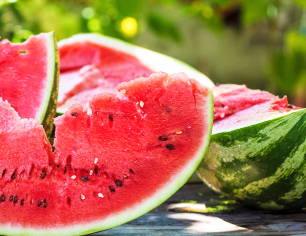 istock ripe red watermelon with seeds on a wooden table 1027738278