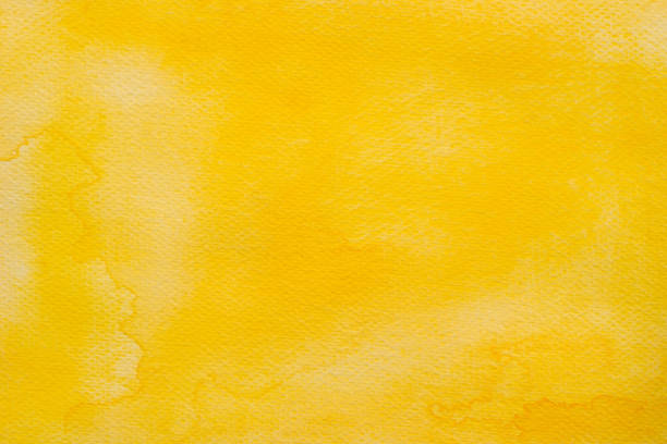 istock yellow watercolor on paper painted background texture 1027742088