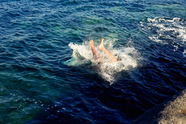 istock Jump in the blue sea 1027758016