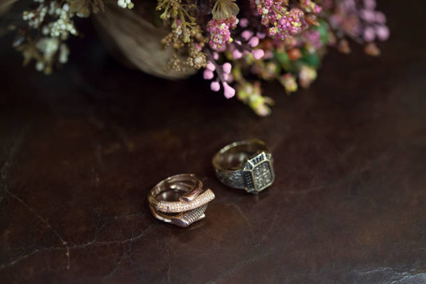 istock Vintage bridal bouquet and rings 1027758180