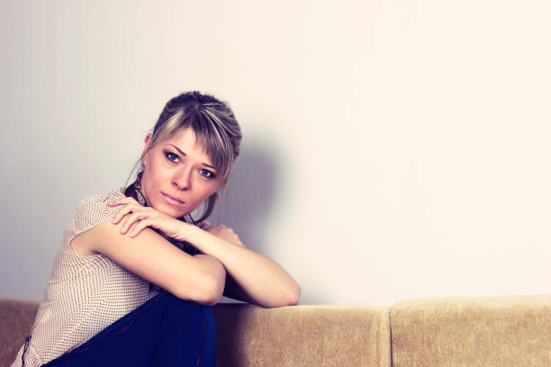istock Lonely sad woman deep in the thoughts 1027761902