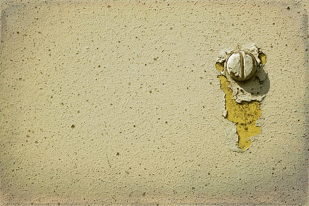 Grungy wall background with screw stock photo